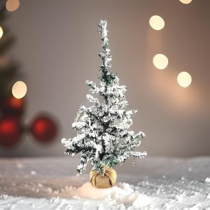 Sapin artificiel avec neige et lumières
